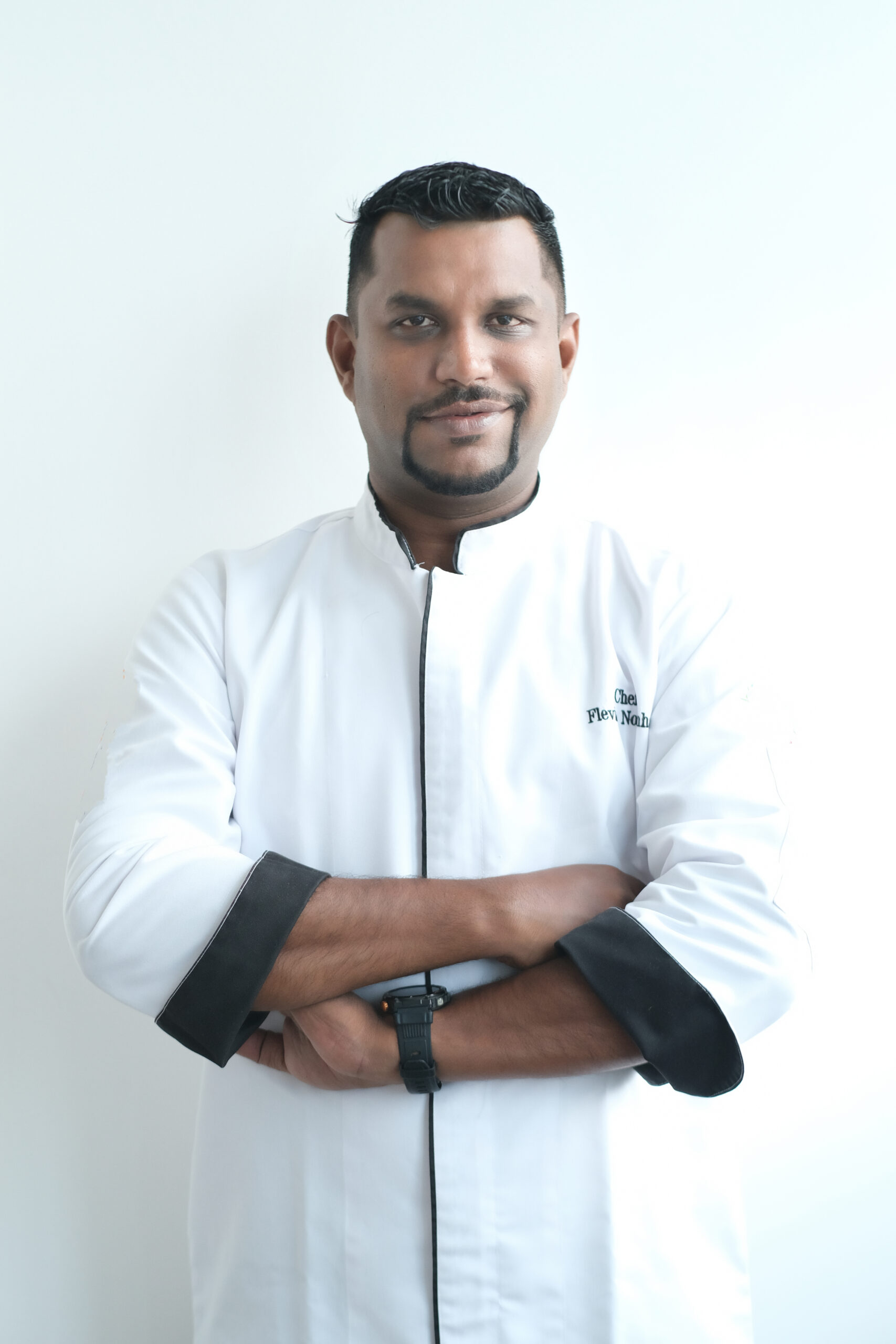 Mr. Flevis Noronha